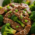 Served Chinese Beef and Broccoli with sesame and scallions