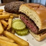 Easy Stovetop Burgers served with fries and pickles