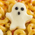 Ghoul-gheroni and Cheese with mozzarella ghosts and olive eyes