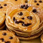 Halloween Pancakes served with syrup and sugar dusting