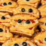 Platter of Spooky Mummy Toast with melted mozzarella bandages