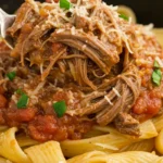 Slow Cooker Beef Ragu over pappardelle with Parmesan