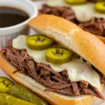 Slow Cooker Italian Beef Sandwich served with au jus